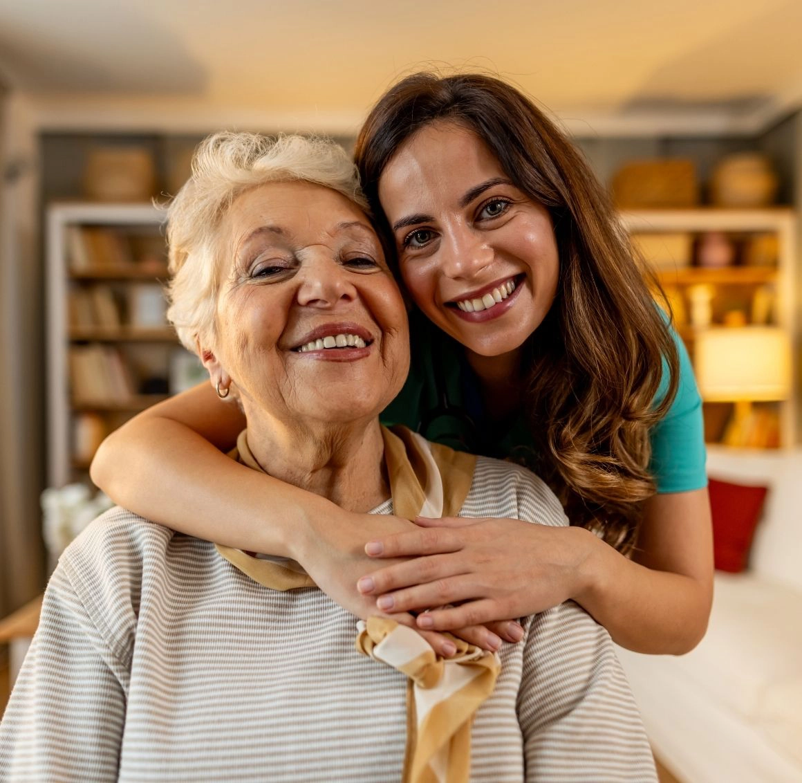Caregiver spending time with a senior woman Caregiver spending time with a senior woman