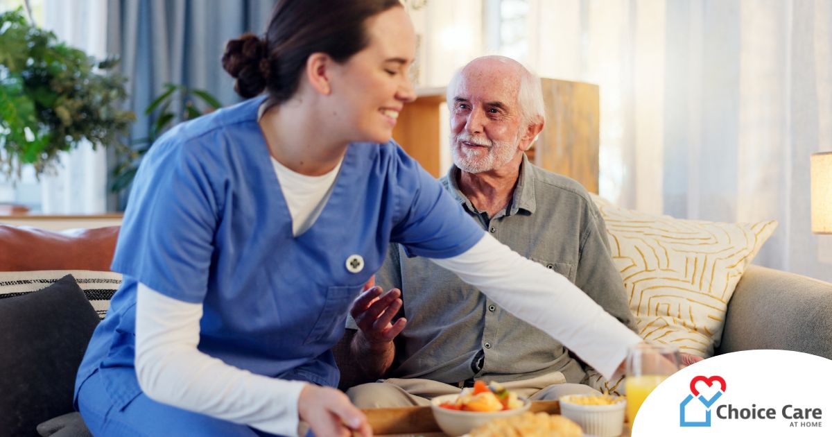 Caregiver providing senior care at home to manage parkinson’s and related symptoms.