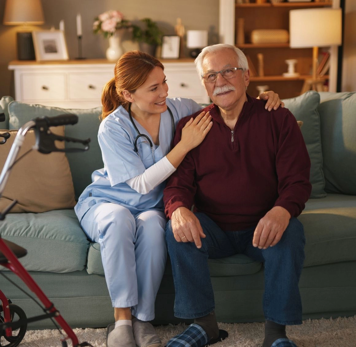caregiver sitting with senior