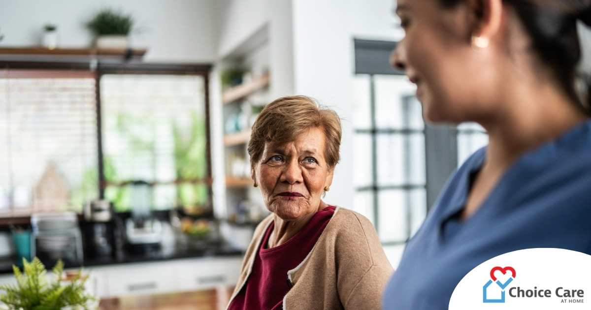 Caregiver provides attentive senior care as part of diabetes awareness