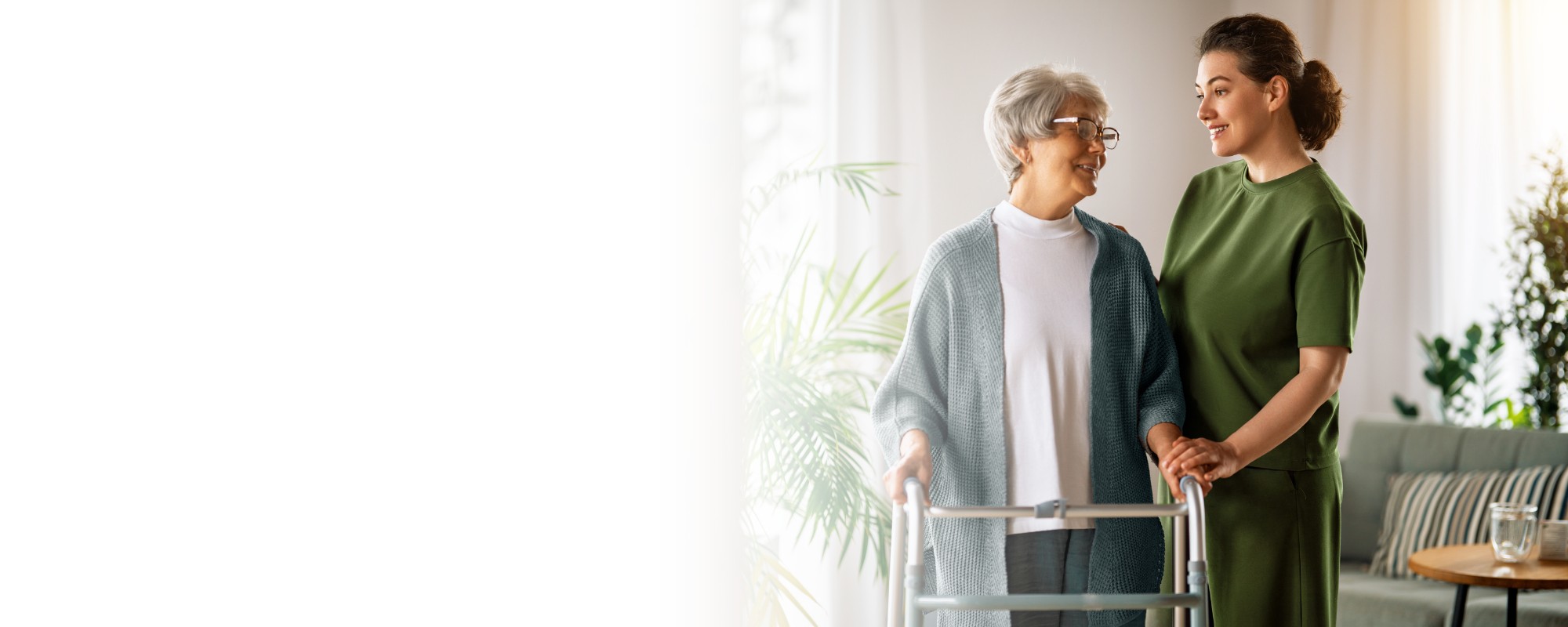 caregiver assisting senior woman with walker – Home Care in Calhoun County caregiver assisting senior woman with walker - Home Care in Calhoun County