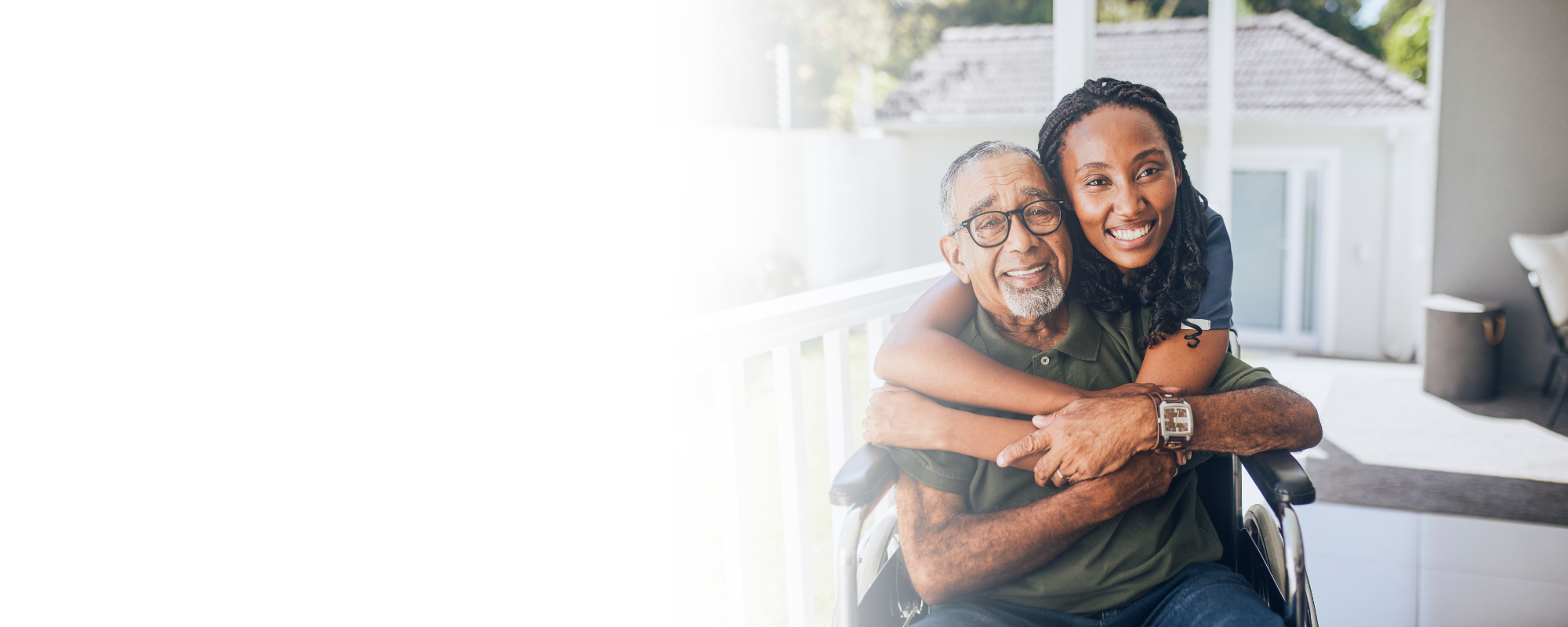 Caregiver hugging senior man in wheelchair on patio – Home Care in Boone County, WV Caregiver hugging senior man in wheelchair on patio - Home Care in Boone County, WV